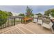 Inviting deck with black metal railing and comfortable seating, offering a relaxing outdoor space with nice backyard views at 5241 E 111 Th Ct, Thornton, CO 80233