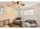 Relaxing bedroom with two large beanbag chairs and natural light from two windows at 5241 E 111Th Ct, Thornton, CO 80233