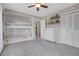 Cozy bedroom featuring built-in bunk beds and ample storage at 1692 Sand Lily Dr, Golden, CO 80401