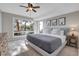 Serene main bedroom with large windows offering panoramic views at 1692 Sand Lily Dr, Golden, CO 80401