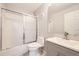 Well-lit bathroom with a tub/shower combo and neutral-colored vanity at 7440 S Blackhawk St # 15-202, Englewood, CO 80112