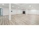 Open basement featuring hard surface flooring, recessed lighting, and flexible space for customization at 27196 E Alder Dr, Aurora, CO 80016