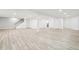 Large open basement space with durable floors, and bright recessed lighting at 27196 E Alder Dr, Aurora, CO 80016