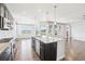 Open kitchen showcasing island with a view, stainless appliances, and lots of natural light at 27196 E Alder Dr, Aurora, CO 80016