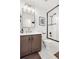 Modern bathroom with herringbone floor and shower at 5935 E 129Th Pl, Thornton, CO 80602