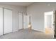 Bedroom with large closets and access to the ensuite bathroom at 7722 S Steele St, Centennial, CO 80122