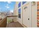 Welcoming front door with decorative windows and a charming porch at 7722 S Steele St, Centennial, CO 80122