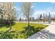 Community tennis court with a dark fence offers recreation for residents at 7722 S Steele St, Centennial, CO 80122