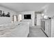 Bright bedroom with white walls, carpeted floor, and neutral-toned furnishings for a serene and comfortable retreat at 28304 E 6Th Pl, Watkins, CO 80137