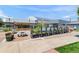 Community outdoor dining at The Hangar, a vibrant space for gathering and enjoying the neighborhood's amenities at 6849 E Lowry Blvd, Denver, CO 80230