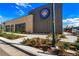Denver Beer Co building exterior with a modern design, featuring a prominent logo and well-maintained landscaping at 6849 E Lowry Blvd, Denver, CO 80230