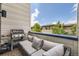Relaxing outdoor patio featuring comfortable seating, a grill, and pleasant neighborhood views at 6849 E Lowry Blvd, Denver, CO 80230
