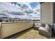 Spacious rooftop patio offering comfortable seating and panoramic views of the surrounding cityscape at 6849 E Lowry Blvd, Denver, CO 80230