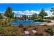 Colorful community playground features modern play equipment, surrounded by landscaped areas and lush greenery at 6849 E Lowry Blvd, Denver, CO 80230