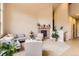 Bright living room with vaulted ceilings, fireplace, and neutral decor at 555 Gallegos Cir, Erie, CO 80516