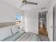 Bright bedroom with a large window, closet and ceiling fan at 1335 N Alton St, Aurora, CO 80010