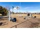 Outdoor fitness area in a public park with exercise equipment on a wood chip surface at 1335 N Alton St, Aurora, CO 80010