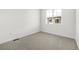 Bedroom with a window overlooking a neighboring structure at 2887 E 103Rd Dr, Thornton, CO 80229