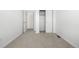 Bedroom featuring bright white trim, fresh carpet and closet at 2887 E 103Rd Dr, Thornton, CO 80229