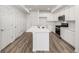 Stylish kitchen with stainless steel appliances and a large center island at 2887 E 103Rd Dr, Thornton, CO 80229