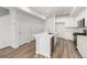 Well-equipped kitchen featuring an island and modern appliances at 2887 E 103Rd Dr, Thornton, CO 80229