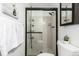 Bathroom with a glass door shower and toilet at 550 S Xenon Ct, Lakewood, CO 80228