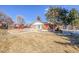 Charming brick building exterior near a playground and community center for resident enjoyment at 550 S Xenon Ct, Lakewood, CO 80228