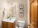 Cozy bathroom featuring a single sink, decorative art, and a convenient towel rack at 11163 Conifer Mountain Rd, Conifer, CO 80433