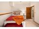 Comfortable bedroom with side table and a cozy bed, providing a serene retreat at 11163 Conifer Mountain Rd, Conifer, CO 80433