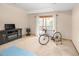 Spacious bedroom with neutral carpet and walk out to a balcony with scenic views at 11163 Conifer Mountain Rd, Conifer, CO 80433