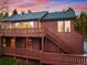 Multi-level deck home with stair access, offering seamless indoor-outdoor living, surrounded by nature at 11163 Conifer Mountain Rd, Conifer, CO 80433