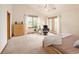 Bright primary bedroom with vaulted ceiling, a cozy reading nook, and large windows at 11163 Conifer Mountain Rd, Conifer, CO 80433