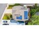 Top-down view showing a house's roof with solar panels and a well-maintained yard with trees at 670 Somerset Dr, Golden, CO 80401