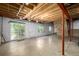 Unfinished basement with walkout access and a climbing wall feature at 670 Somerset Dr, Golden, CO 80401