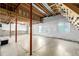 An unfinished basement with exposed ductwork and a climbing wall at 670 Somerset Dr, Golden, CO 80401