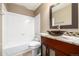 Bathroom featuring a glass vessel sink, granite counters, and a shower-over-tub combination at 670 Somerset Dr, Golden, CO 80401