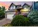 Charming two-story home features a front porch, two car garage, and beautiful exterior paint at 670 Somerset Dr, Golden, CO 80401