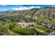 Aerial shot of neighborhood and school highlighting location and community amenities in a picturesque setting at 670 Somerset Dr, Golden, CO 80401