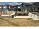 Community playground with tables, modern homes, and picnic area in neighborhood at 716 Belay St, Erie, CO 80516