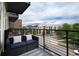 Private balcony with city views and seating area at 7240 W Custer Ave # 307, Lakewood, CO 80226