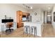 Modern kitchen with stainless steel appliances and an island with seating at 7240 W Custer Ave # 307, Lakewood, CO 80226