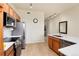 Modern kitchen with stainless steel appliances and light wood cabinetry at 7240 W Custer Ave # 307, Lakewood, CO 80226