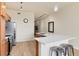 Modern kitchen with stainless steel appliances and an L-shaped island at 7240 W Custer Ave # 307, Lakewood, CO 80226