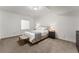 Basement bedroom with a queen bed and neutral decor at 3260 S Corona St, Englewood, CO 80113