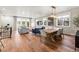 Open concept dining room and living area with hardwood floors at 3260 S Corona St, Englewood, CO 80113