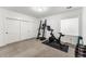 Bright home gym with Peloton bike and weight equipment at 3260 S Corona St, Englewood, CO 80113