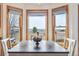 Bright dining area with view and built-in seating at 10891 Parker Vista Rd, Parker, CO 80138