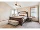 Spacious main bedroom with a large bed and sitting area at 10891 Parker Vista Rd, Parker, CO 80138