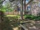 A backyard with grass and pavers is framed by a wooden fence at 2750 S Rifle St, Aurora, CO 80013