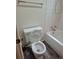 Bathroom featuring a white toilet, and shower-tub combo at 2750 S Rifle St, Aurora, CO 80013